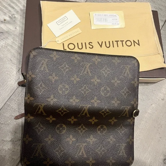 Authentic, LOUIS VUITTON 
Monogram Insolite Wallet - Picture 3 of 8